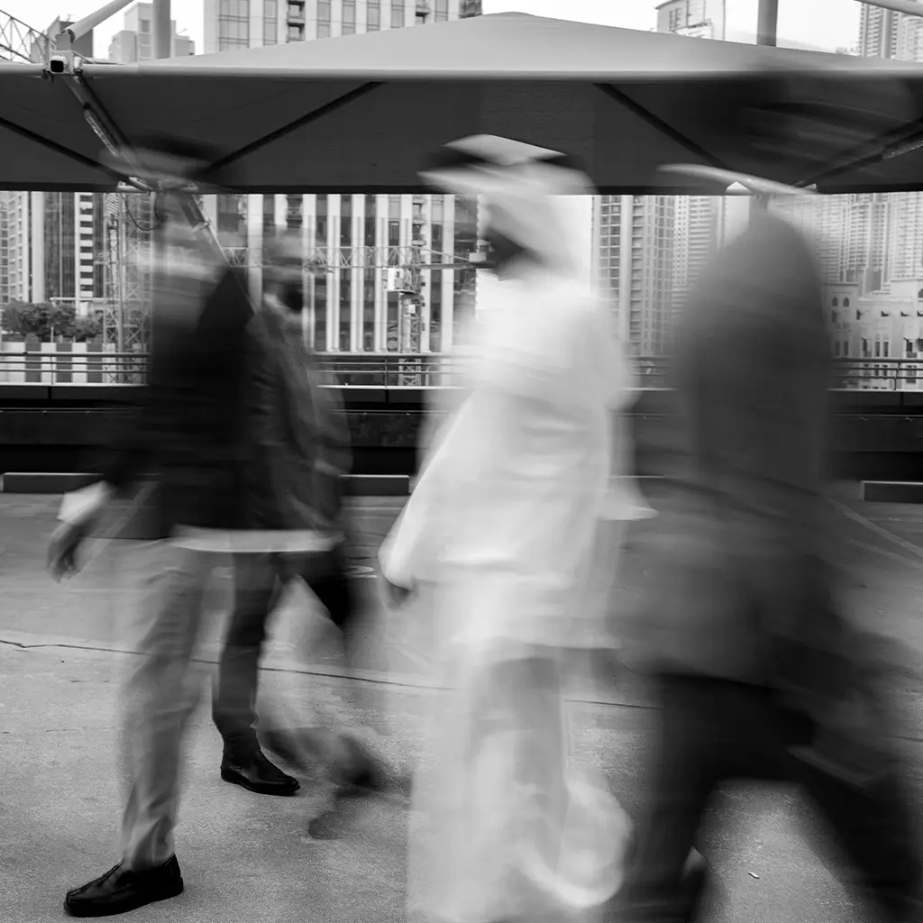 Person working on a laptop in a modern office